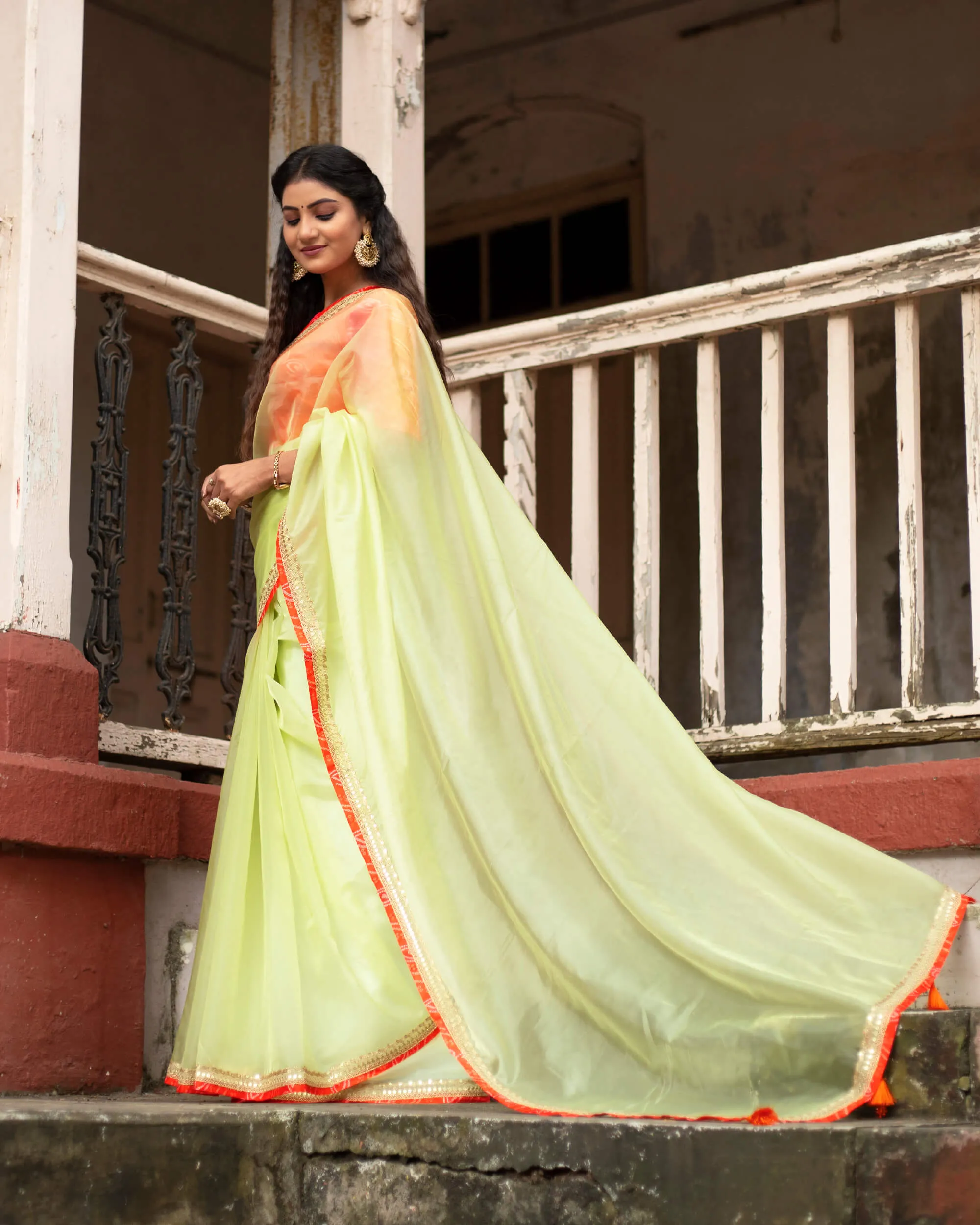 Basil Green Plain Liquid Organza Saree With Bandhani Lace