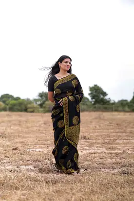 Jharokha -Black and green floral silk cotton Ajrakh handblockprinted saree