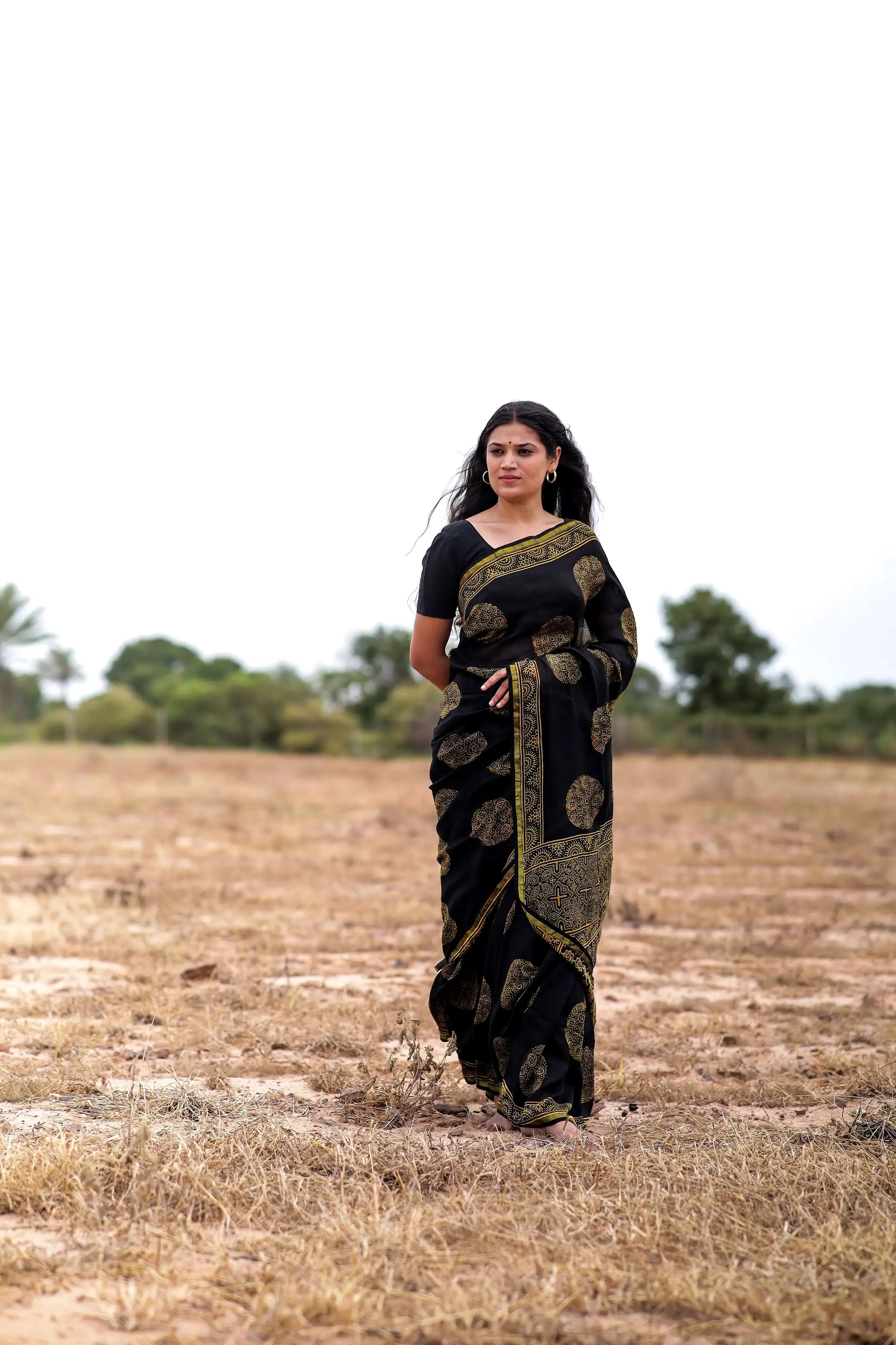 Jharokha -Black and green floral silk cotton Ajrakh handblockprinted saree