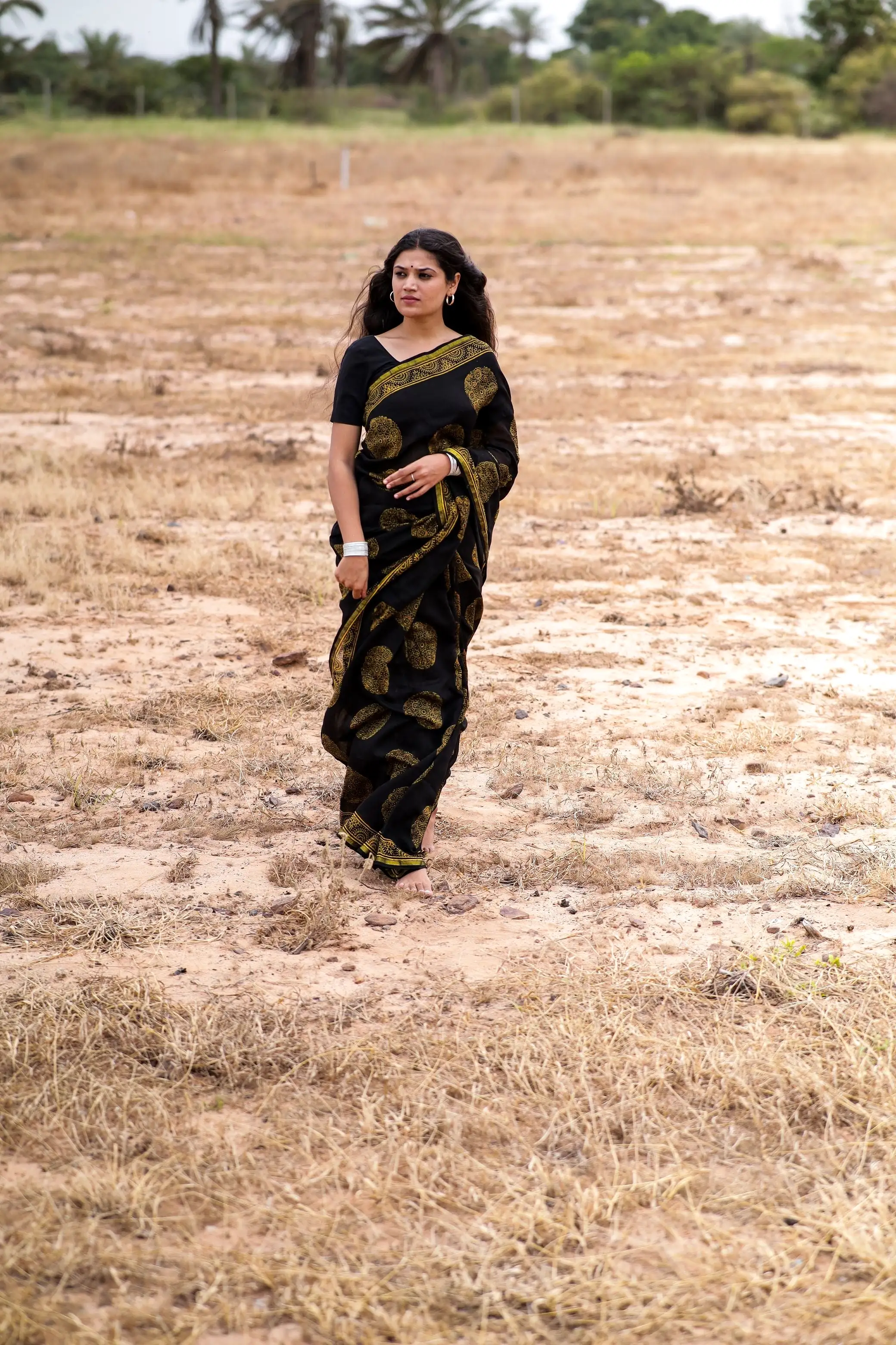 Jharokha -Black and green floral silk cotton Ajrakh handblockprinted saree