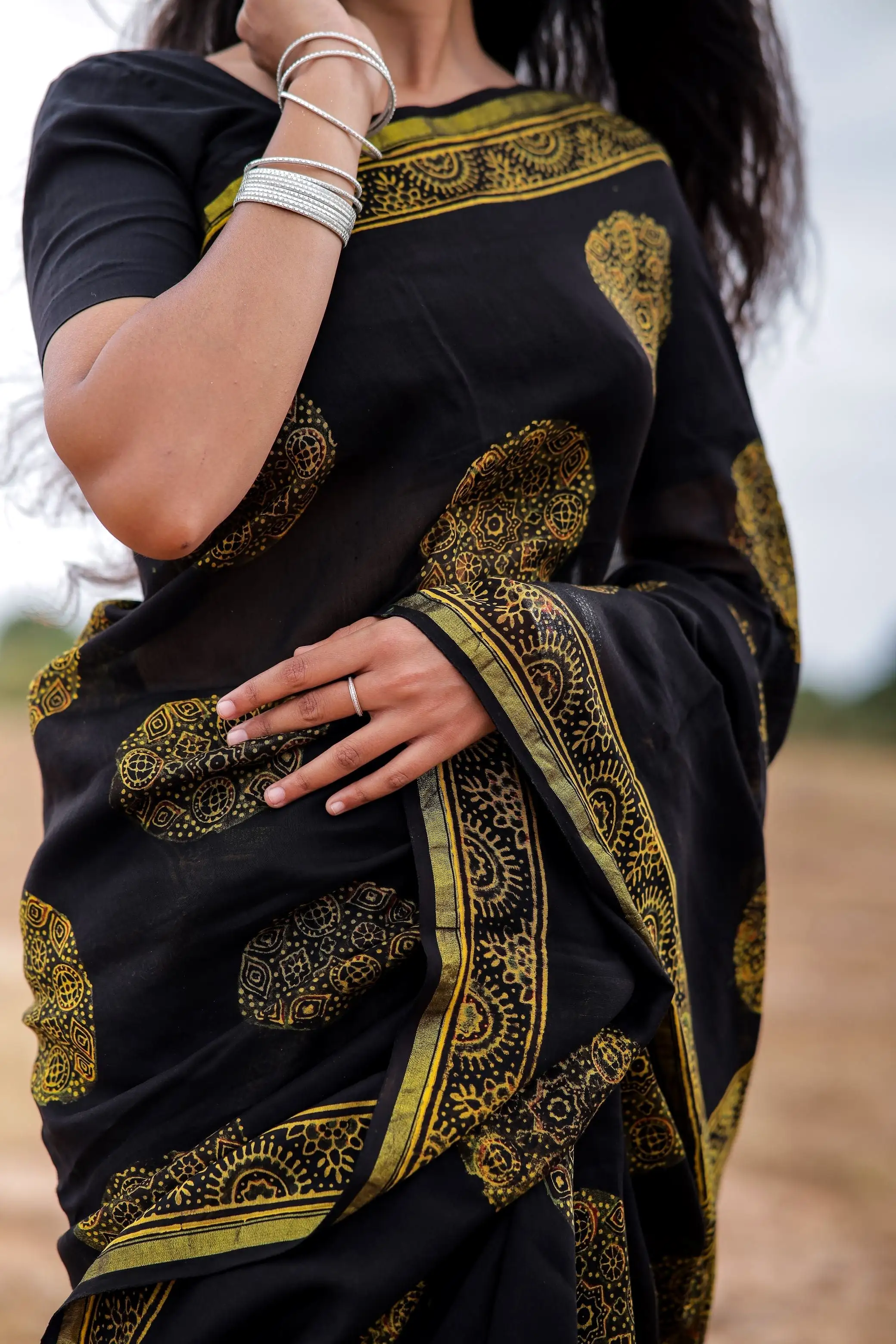 Jharokha -Black and green floral silk cotton Ajrakh handblockprinted saree